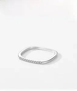 Macro shot of S925 sterling silver square ring with delicate white zircon micro-pave setting