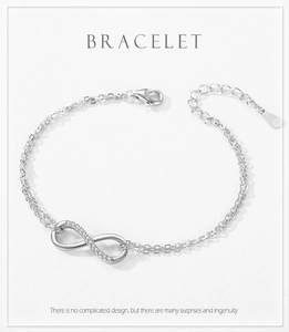 Macro detail of S925 sterling silver infinity bracelet with pavé cubic zirconia diamonds