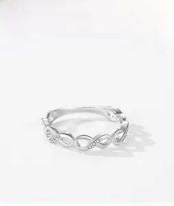Macro shot of S925 sterling silver infinity ring with micro-pave cubic zirconia details
