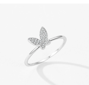 Macro shot of silver butterfly ring with shimmering cubic zirconia micro-pave detailing