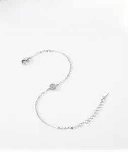 Macro detail of S925 sterling silver bracelet with cubic zirconia and clasp stamp