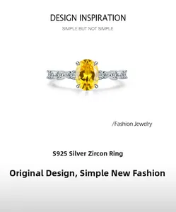 Detail of S925 sterling silver ring featuring a yellow oval zircon and teardrop stones