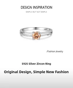 Détail d'une bague en argent S925 avec zircon champagne et anneau décalé avec poinçon S925
