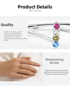 Macro view of S925 sterling silver V-shaped ring with colorful cubic zirconia stones