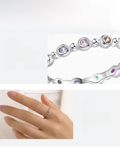 Detailed macro shot of S925 sterling silver ring with colorful cubic zirconia stones