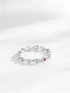 Detail of S925 sterling silver bubble ring with colorful zircon stones in a row