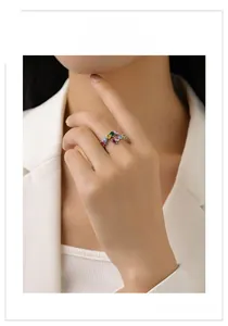 Detailed view of a model wearing a silver S925 ring with geometric colorful zircons