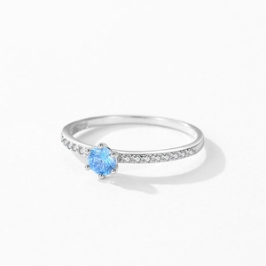 Elegant S925 silver ring with a round light blue zircon and sparkling side stones