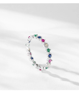 Macro detail of S925 silver ring featuring multi-color zircon stones and beaded edges