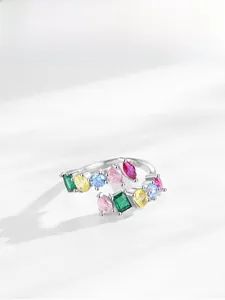 Detail of S925 silver ring featuring vibrant rainbow zircon stones and geometric design