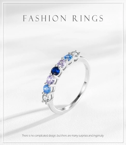 Close-up of S925 silver ring featuring a gradient of seven multi-colored zircon stones