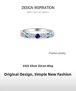 Macro detail of S925 sterling silver band with blue zircons and engraved S925 hallmark
