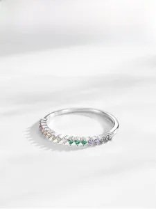 Close-up of S925 silver ring featuring a row of vibrant gradient zircon gemstones