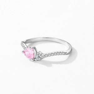 Elegant S925 silver ring featuring a pink heart zircon and side stones on a white background
