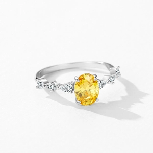 Luxurious S925 sterling silver ring with oval yellow zircon and white accent stones