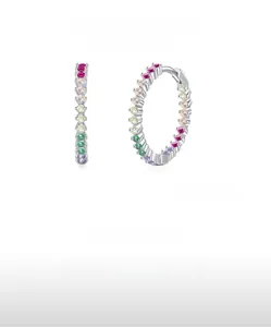 Macro shot of S925 silver hoop earrings with multi-colored pavé cubic zirconia stones