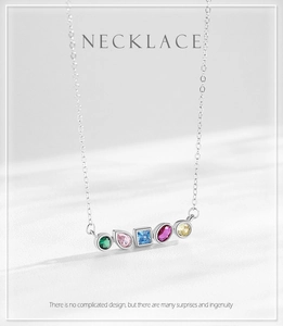 Detailed close-up of S925 silver necklace featuring five vibrant geometric rainbow zircon stones