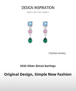 Close-up of S925 silver studs with blue square, pink round, and green teardrop zircon gems