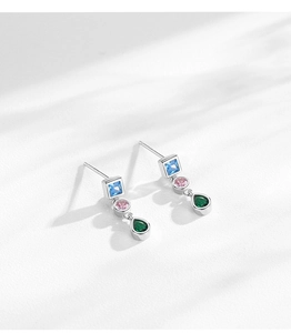 Close-up of S925 silver studs with blue, pink and green zircon stones in drop design