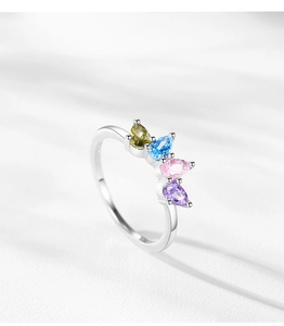 Detailed shot of S925 sterling silver crown ring featuring four colorful pear-cut stones