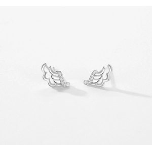 Macro shot of S925 sterling silver angel wing studs with sparkling pave-set white zircons