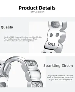 Macro detail of S925 sterling silver earring with cubic zirconia and mirror polishing
