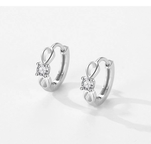 Macro shot of S925 sterling silver infinity earrings with micro-inlaid zircon