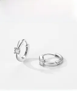 Close-up of S925 silver hoop earrings with round-cut sparkling cubic zirconia