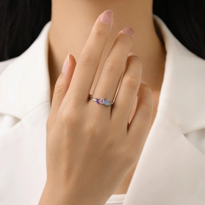 S925 silver open ring with three colorful pear-shaped zircons worn by a model