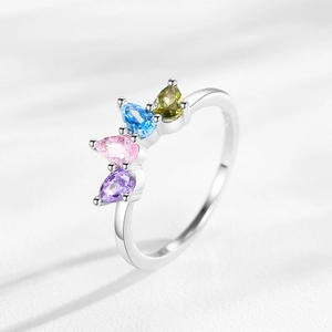 S925 silver ring with four-color pear-cut rainbow zircons in a elegant prong setting