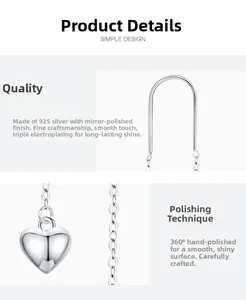 Detail view of 925 silver heart tassel earrings with polished finish and elegant chains