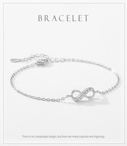Detail of S925 sterling silver infinity bracelet featuring micro-paved cubic zirconia