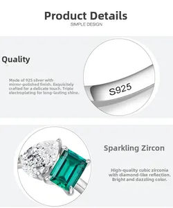 Detail of S925 silver ring featuring pear-cut and emerald-cut cubic zirconia stones