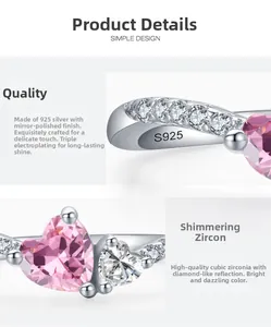 Macro view of S925 silver stamp and pink heart zircon setting on polished ring