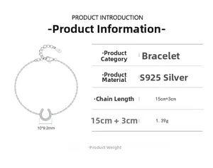 Macro detail of S925 sterling silver U-shaped bracelet with horseshoe pavé crystal pendant
