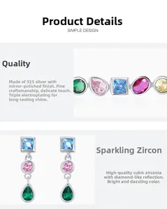 Detailed macro view of S925 silver earrings with colorful cubic zirconia gemstones
