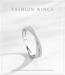 Close-up of S925 silver crossover ring featuring micro-pave cubic zirconia details