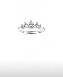 Macro detail of crown-shaped S925 sterling silver ring with pear-cut cubic zirconia