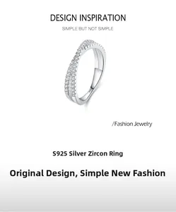 Detail of S925 silver ring featuring dual-row crisscross bands with inlaid cubic zirconia