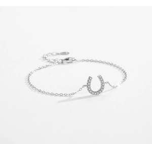 Detailed macro view of S925 silver U-shaped bracelet with sparkling micro-pave zircons