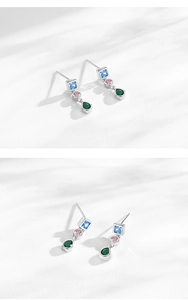 Detailed view of S925 silver earrings with colorful square, round and teardrop zircons