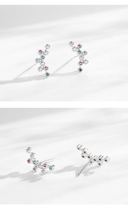 Detailed view of S925 silver stud earrings with colorful zircon stones and push-back pin