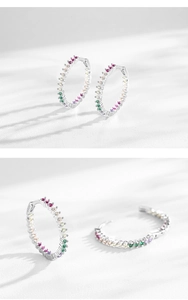 Detailed view of S925 silver hoop earrings with multi-color cubic zirconia stones
