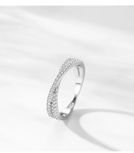 Close-up of S925 sterling silver stamp on micro-paved crisscross band ring with small stones