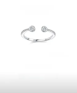 Detail of S925 sterling silver open ring featuring symmetric zircons and micro pave settings