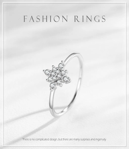Macro shot of S925 sterling silver snowflake ring with delicate micro-pave crystals