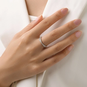 Crossed S925 sterling silver ring with micro-pave crystals on female hand