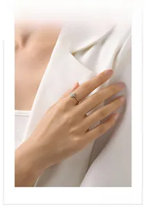 Detail of elegant S925 sterling silver snowflake ring with fine pavé zirconia on model