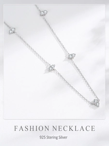 Close-up of S925 sterling silver chain featuring five sparkling butterfly charms