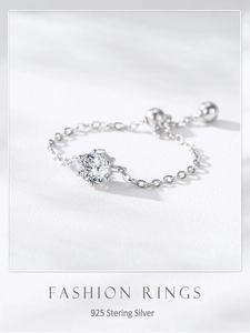 Detailed view of 925 sterling silver six-prong zircon ring with adjustable chain strap